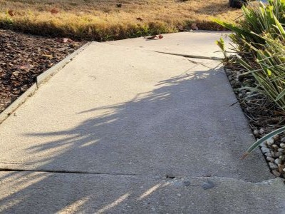 cracking and uneven sidewalk
