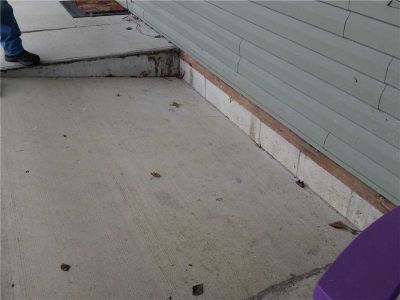 sinking concrete porch