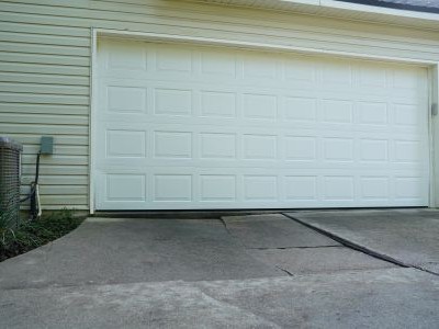 uneven concrete slabs in a driveway